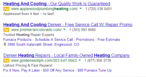 various ad extensions being displayed for ads when typing in the keyword “heating and cooling”